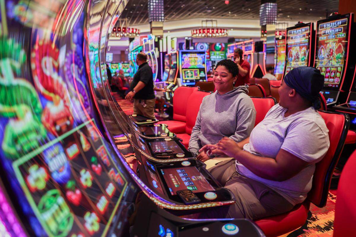 Jasmine Cheek, left, and her spouse, Subia King gamble during the opening of the first part of the Catawba Indians' Catawba Two Kings Casino in Kings Mountain, N.C., on Wednesday, May 20, 2026. 