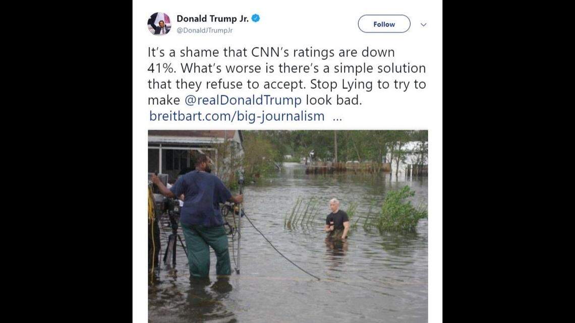 A photo of Anderson Cooper standing waist-deep in flood water while a camera crew stands on higher ground nearby, used to blast media coverage of Florence by Donald Trump Jr. and others, was taken in 2008 in Texas.