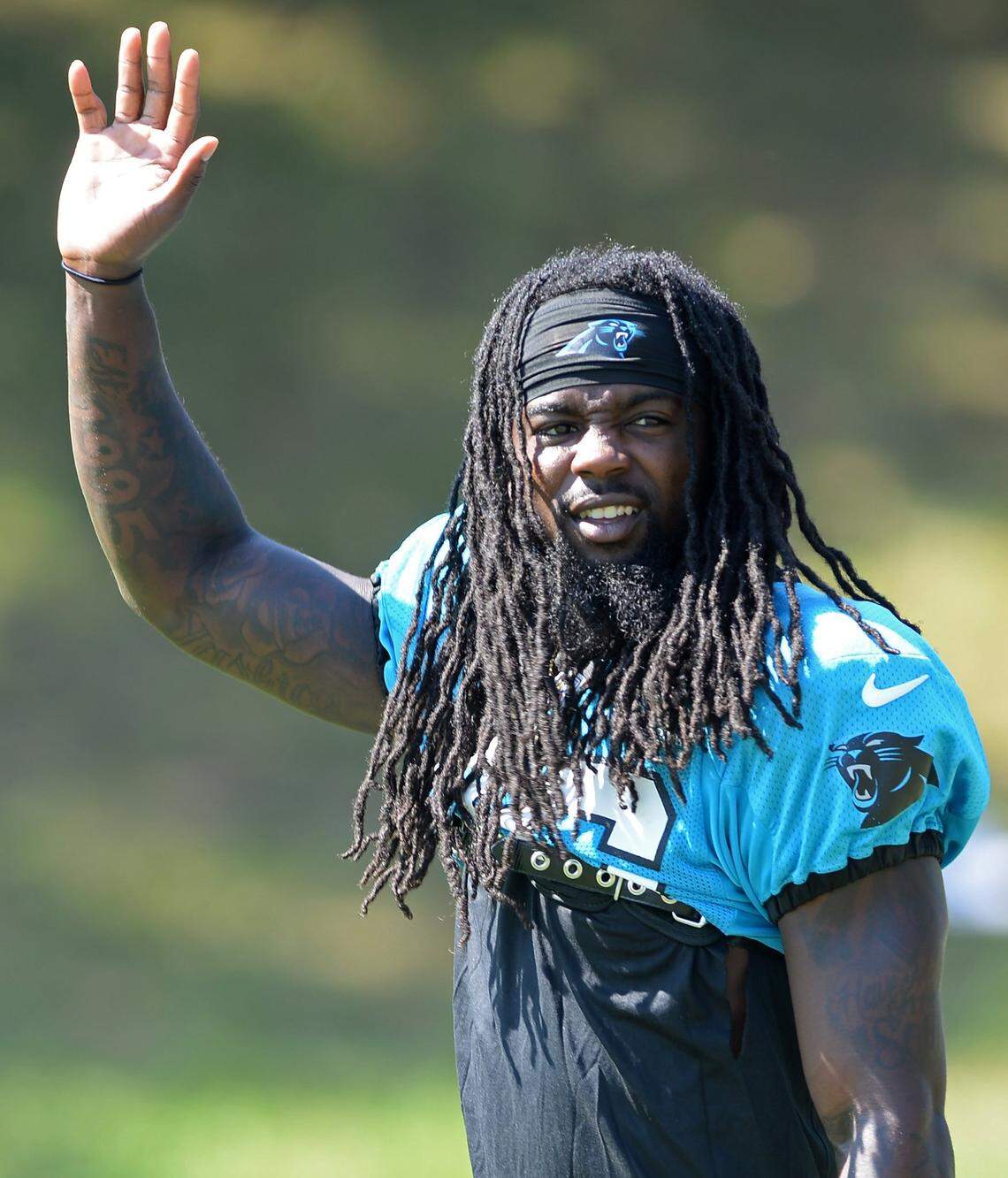 Carolina Panthers cornerback Donte Jackson waves to the fans as he walks to practice on Monday, August 8, 2022 at Wofford College in Spartanburg, SC.