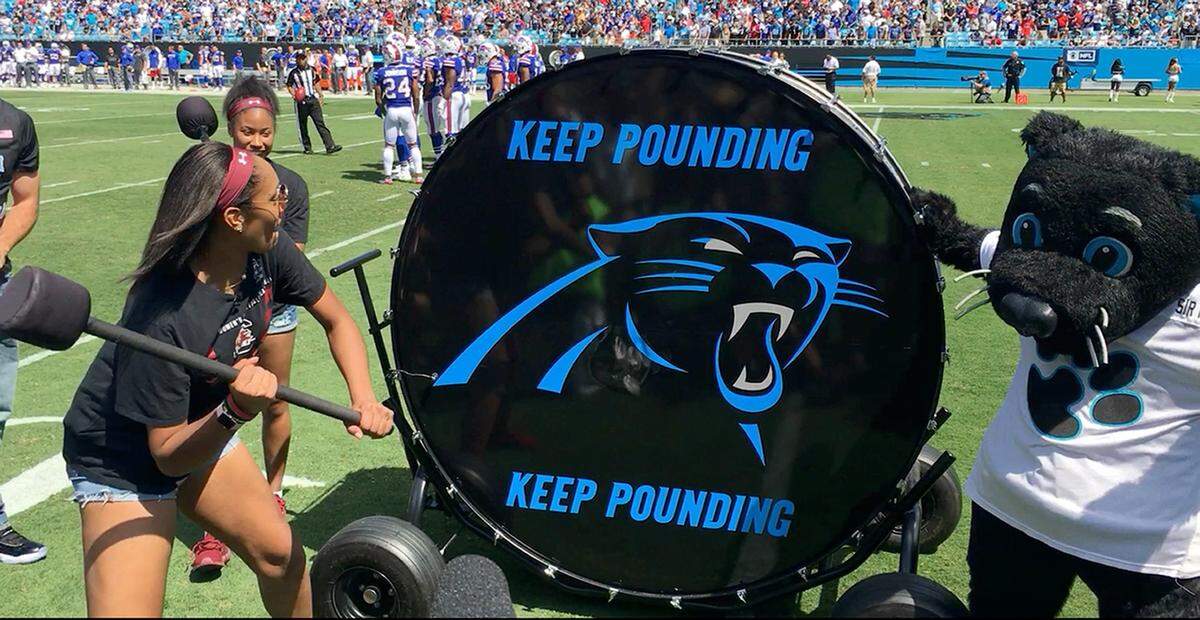 Former Gamecocks basketball player A’ja Wilson hits the Keep Pounding drum prior to the start of the Sept. 17, 2017 Carolina Panthers-Buffalo Bills game at Bank of America Stadium.