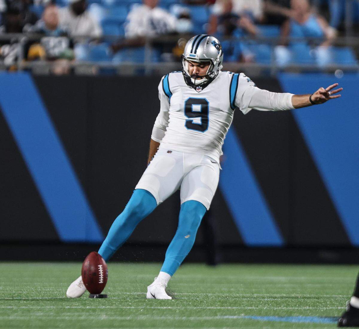 Carolina Panthers Ryan Santoso kicks at the Bank of America Stadium in Charlotte, N.C., on Friday, August 27, 2021.