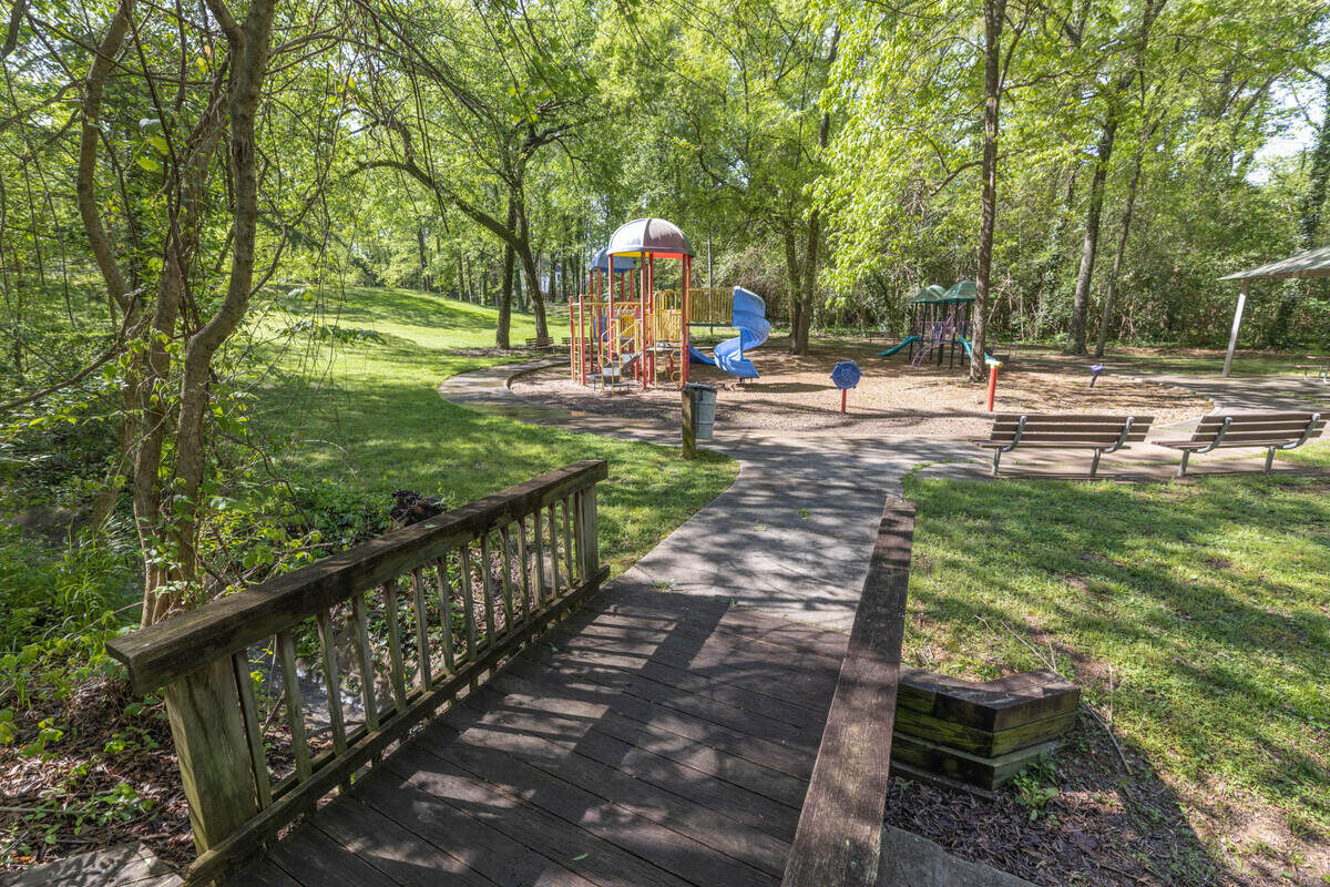 Howie Acres Neighborhood Park has playground equipment including slides, swings and more.