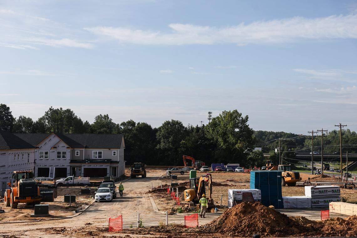 Construction is underway for a new housing development at the intersection of Mt. Holly-Huntersville Road and Oakdale Road in Charlotte, NC on Monday, August 4, 2025. Due to an influx of development of housing and shopping centers, the amount of traffic along this two-lane road has become increasingly congested with traffic. 