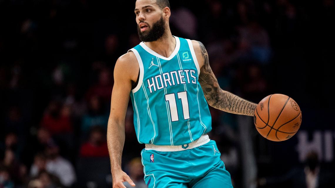 Charlotte Hornets forward Cody Martin (11) brings the ball up court during the first half of an NBA basketball game against the Philadelphia 76ers, Wednesday, Dec. 8, 2021, in Charlotte, N.C. (AP Photo/Matt Kelley)