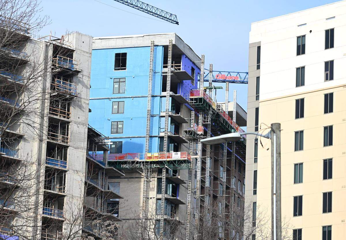 The backside of a construction site along E. Morehead St. in Charlotte, NC on Tuesday. On Monday, three construction workers died after falling about 70 feet when scaffolding collapsed at the construction site.