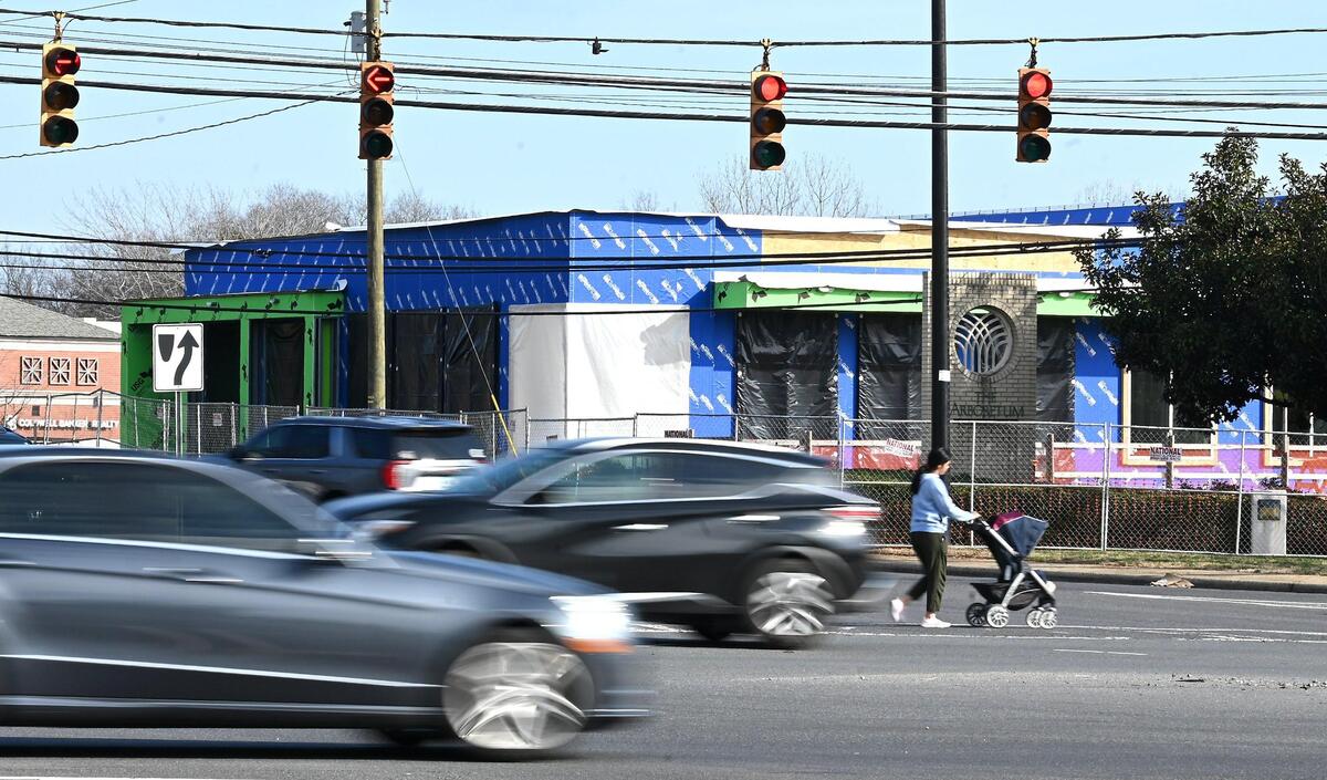 Construction continues on a new Bank of America branch as traffic passes through the intersection at Providence Road and NC 51 on Wednesday, January 11, 2023. The intersection will eventually feature a Publix grocery store also.