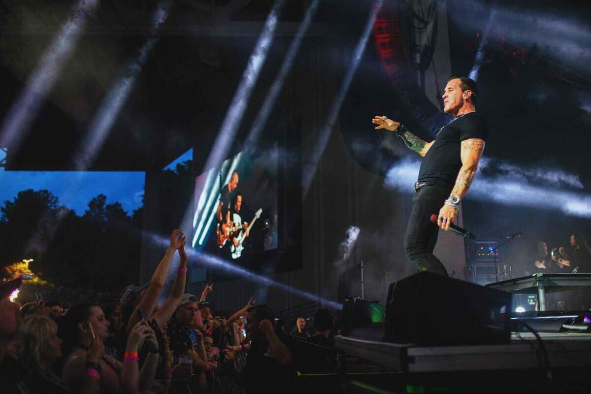 Lead singer Scott Stapp of Creed performs with the band at PNC Music Pavilion in Charlotte on Friday night.