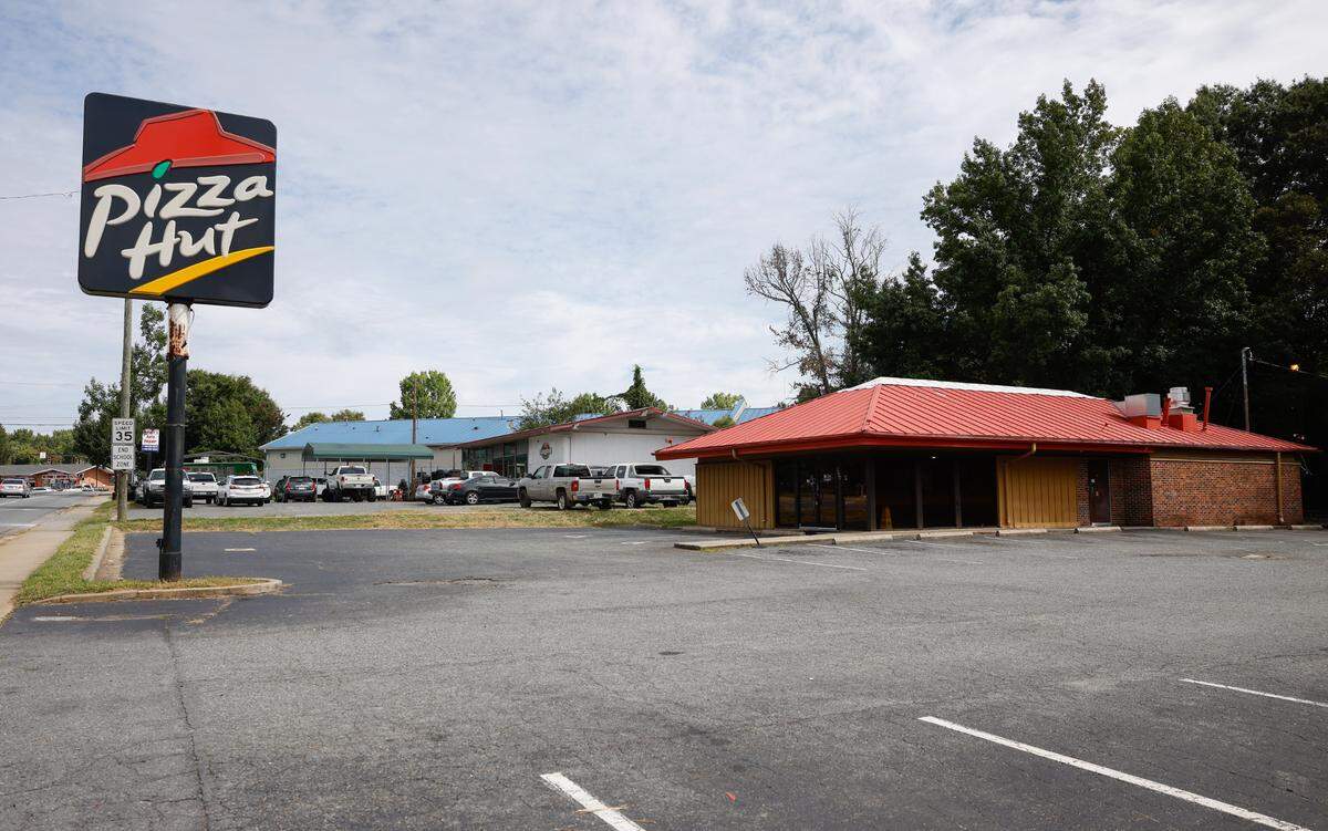 The Pizza Hut at 1909 Milton Road closed in late summer and now sits empty. People living in the Milton Road corridor of east Charlotte said the closing is just the most recent example of a lack of attention from city hall to neighborhood problems that are hindering growth.