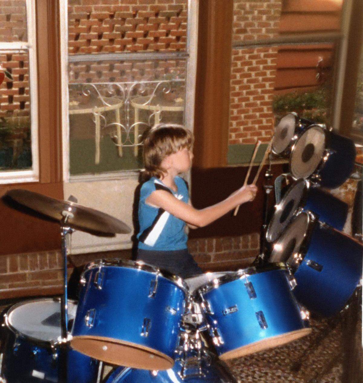 Chris Garges, 12, plays on his first drum kit — a gift from his grandfather.