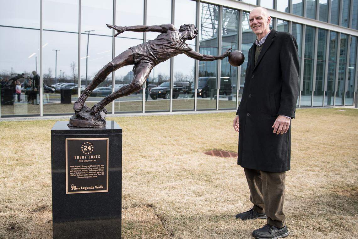 The sculpture of Bobby Jones outside the Philadelphia 76ers’ arena depicts him diving for a loose ball. Jones was part of Philadelphia’s 1983 championship team, which featured fellow hall of famers Julius Erving, Moses Malone and Mo Cheeks.