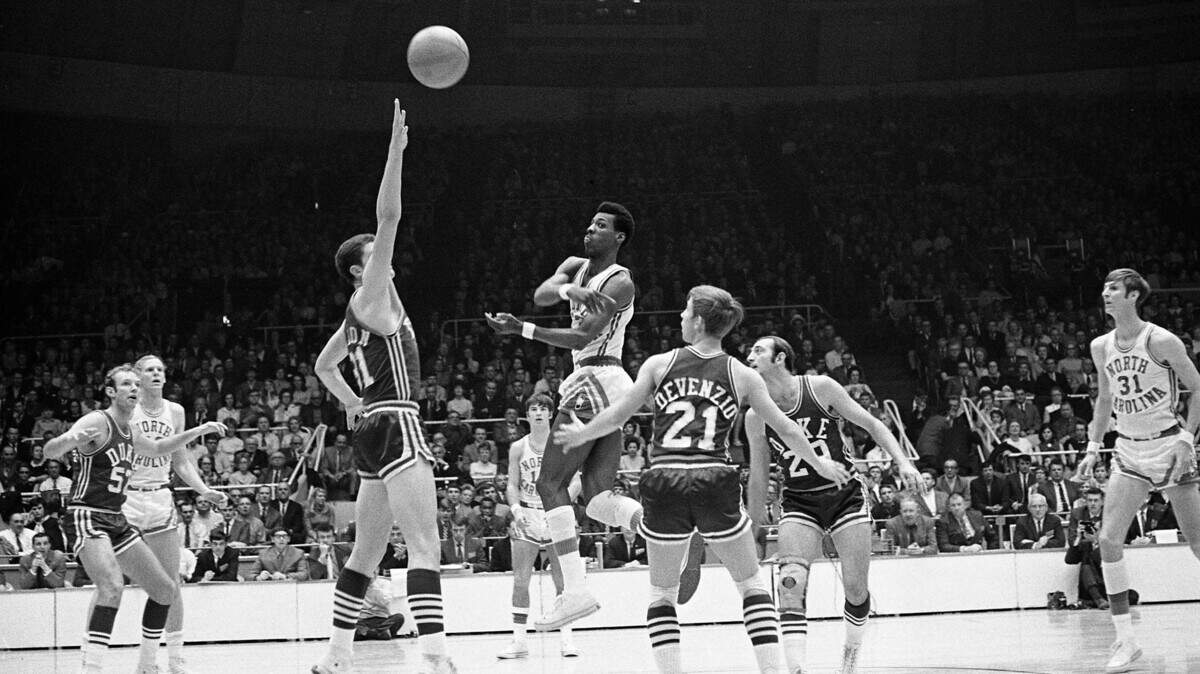North Carolina’s Charlie Scott was the MVP of the 1969 ACC tournament. Duke’s C.B. Claiborne was one of several players tasked with stopping him in the championship game.