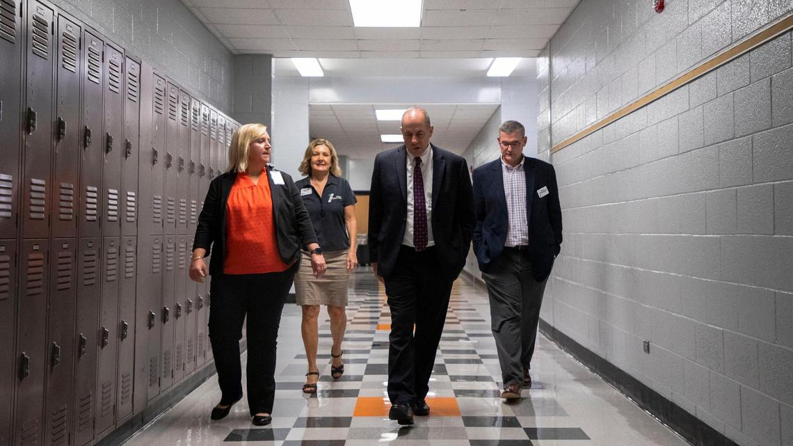 Cabarrus County Schools Superintendent Dr. John Kopicki, center, tours Northwest Cabarrus STEM Middle School, talking to students and staff on the first day of school on Thursday, August 10, 2023. Cabarrus County Schools is preparing to undergo districtwide realignment.