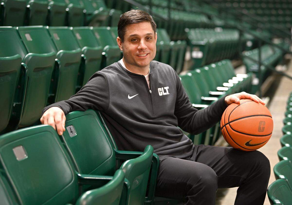 Charlotte 49ers men’s basketball coach Wes Miller sits in the stands at Halton Arena. Miller said in his introductory press conference that he remembers when former coach Bobby Lutz had Halton “humming” in the early 2000s, and he wants to reach that level of excitement once again in the team’s on-campus arena.