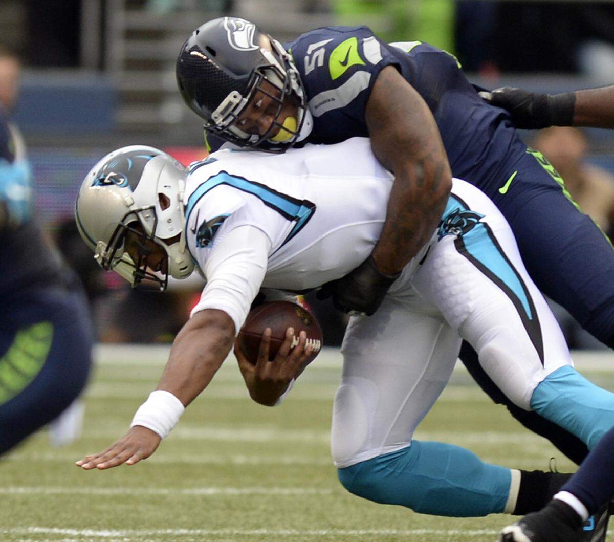 Carolina Panthers quarterback Cam Newton (1) no longer has to worry about getting sacked by Bruce Irvin, who joined the Panthers in 2019.