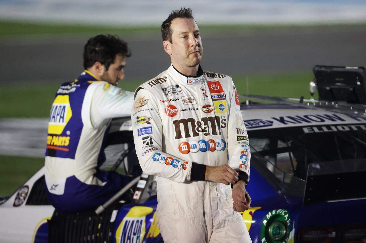 CONCORD, NORTH CAROLINA - MAY 24: Kyle Busch, driver of the #18 M&M’s Red White Blue Toyota, speaks to Chase Elliott, driver of the #9 NAPA Auto Parts Chevrolet, after the NASCAR Cup Series Coca-Cola 600 at Charlotte Motor Speedway on May 24, 2020 in Concord, North Carolina. (Photo by Chris Graythen/Getty Images)