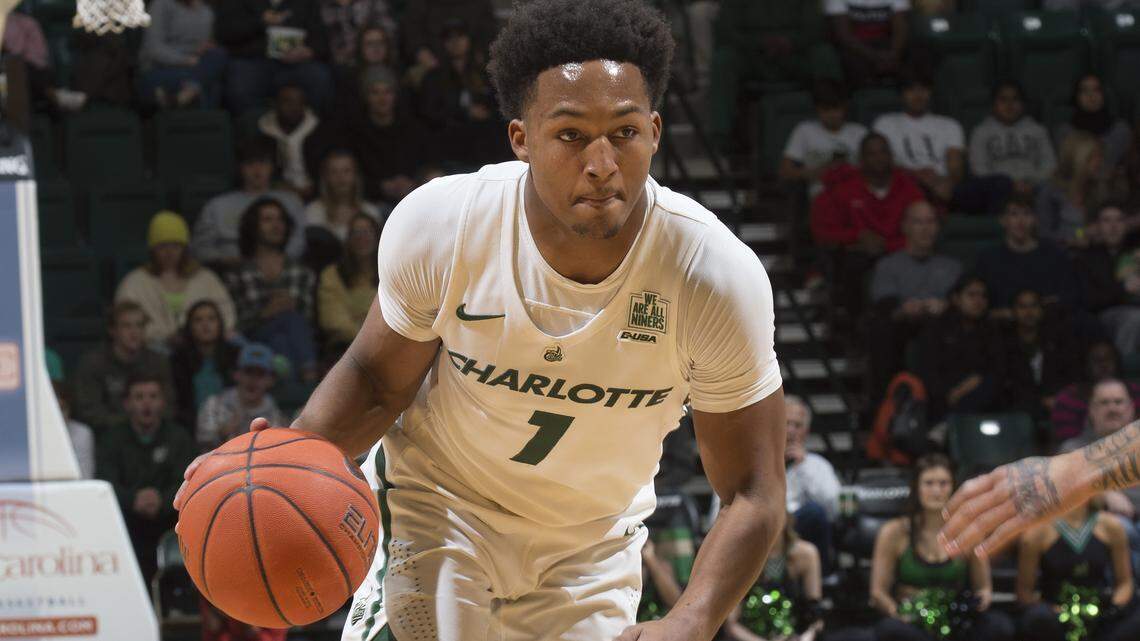 Charlotte 49ers guard Jahmir Young drives toward the basket during his freshman season.