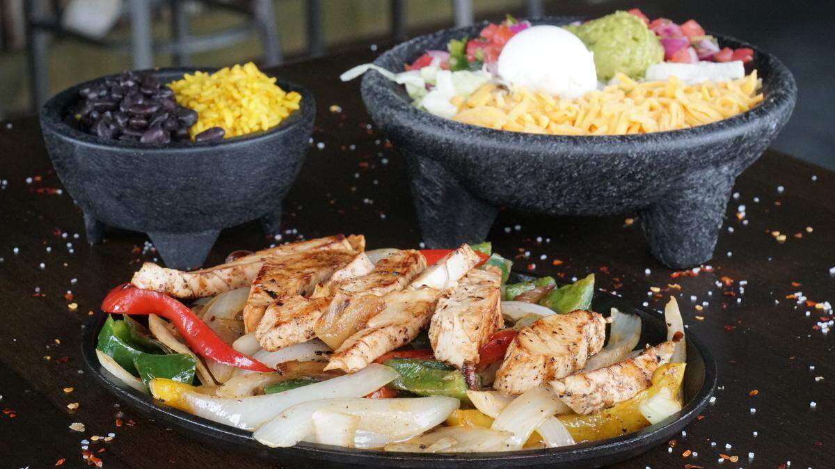 The grilled chicken fajitas at Tipsy Taco are $18.