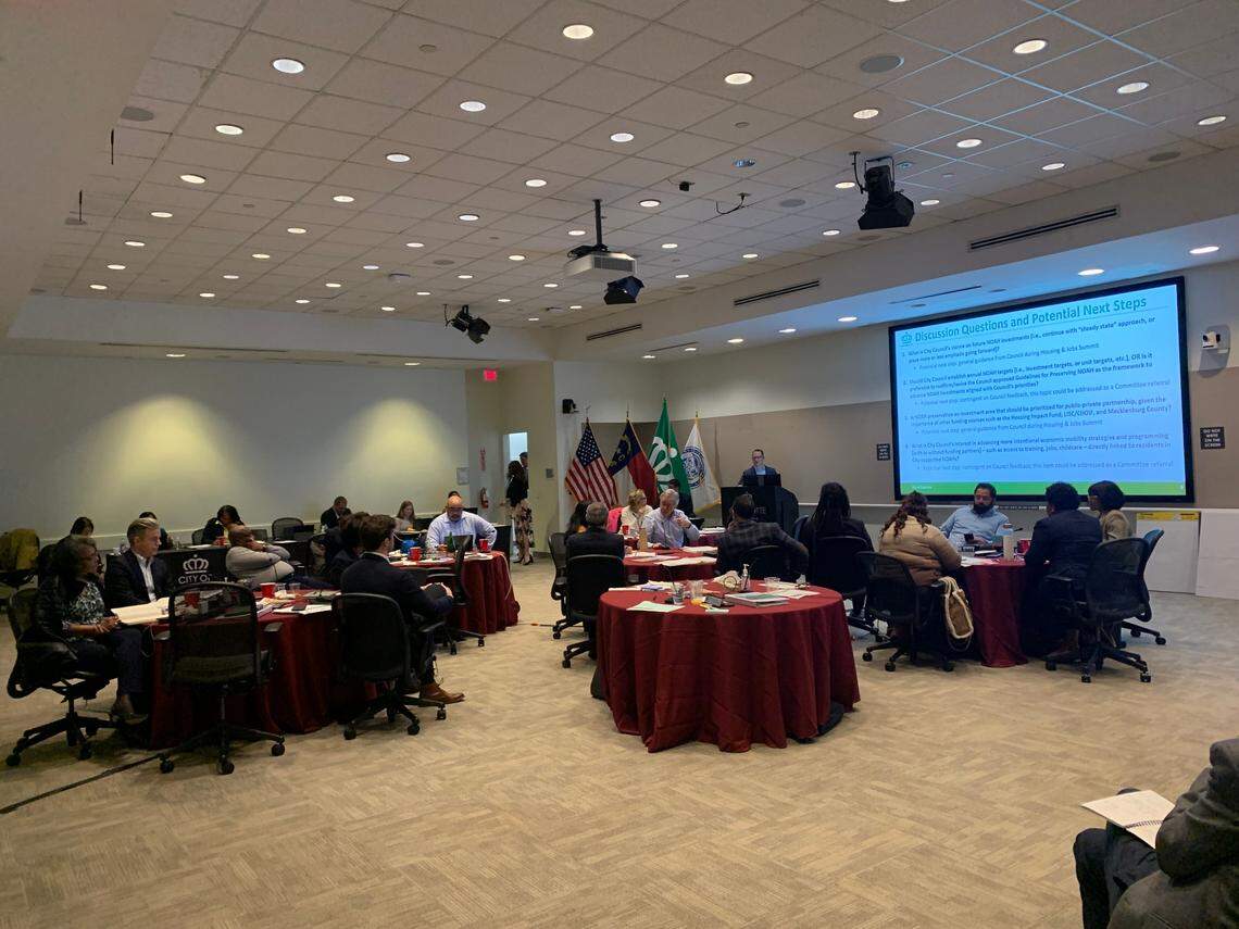 Charlotte City Council and staff participate in small groups during the Housing and Jobs Summit on Tuesday, Jan. 10, 2023.