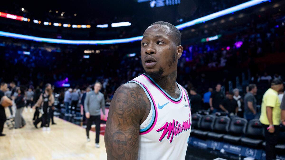 Miami Heat guard Terry Rozier (2) walks back to the locker room after losing to the Chicago Bulls in the second half of their NBA game at Kaseya Center on March 8, 2025, in Miami.