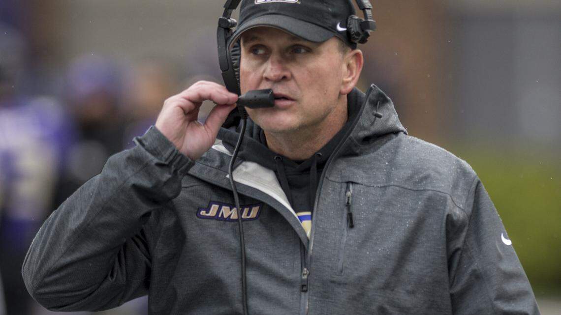 James Madison coach Mike Houston has had a contract offer pulled by the Charlotte 49ers.