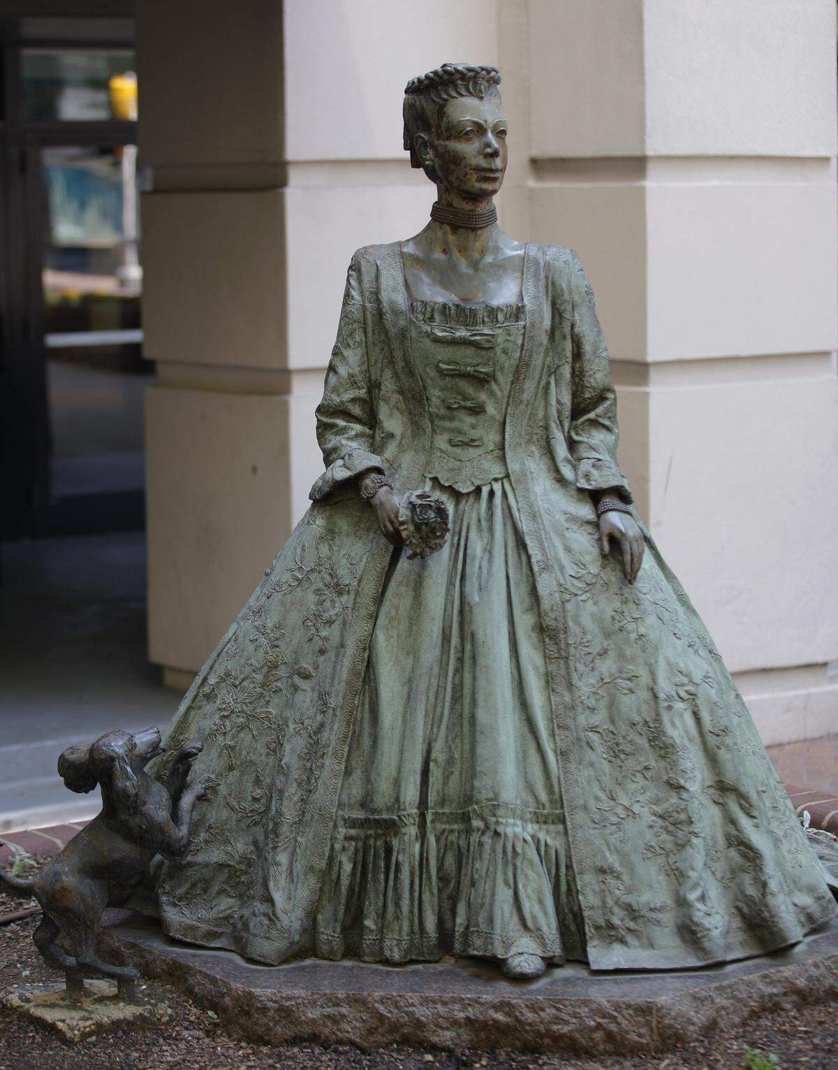 A statue of Queen Charlotte rests along the Liberty Walk on the corner of College St. and Fifth St.
