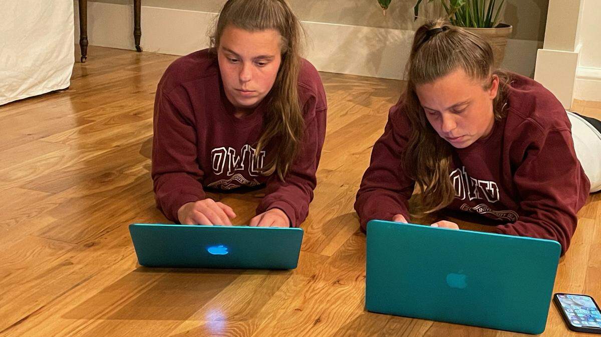 Tirion and Haley Sheafor at home working through Vaccine Fairies to help others find and book COVID-19 vaccine appointments.