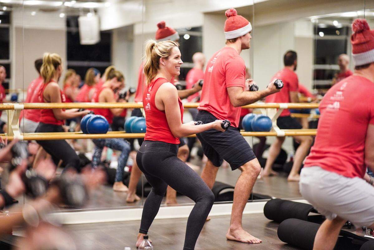 Greg and Kara Olsen hosted a class at Hilliard Studio Method to benefit their Heartest Yard Foundation. (Credit SweatNET)