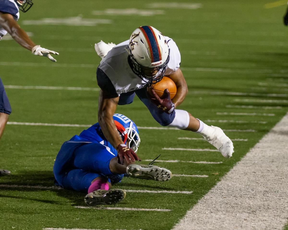 Mallard Creek senior Charles Mincey Jr. runs for a first down early in a Friday win over I-MECK 4A rival North Meck.