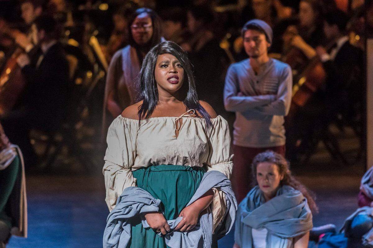 Jennifer Wiggins is a two-season member of the Opera Carolina chorus who has balanced long hours in her day job as a pharmacy technician at Harris Teeter in Stallings.