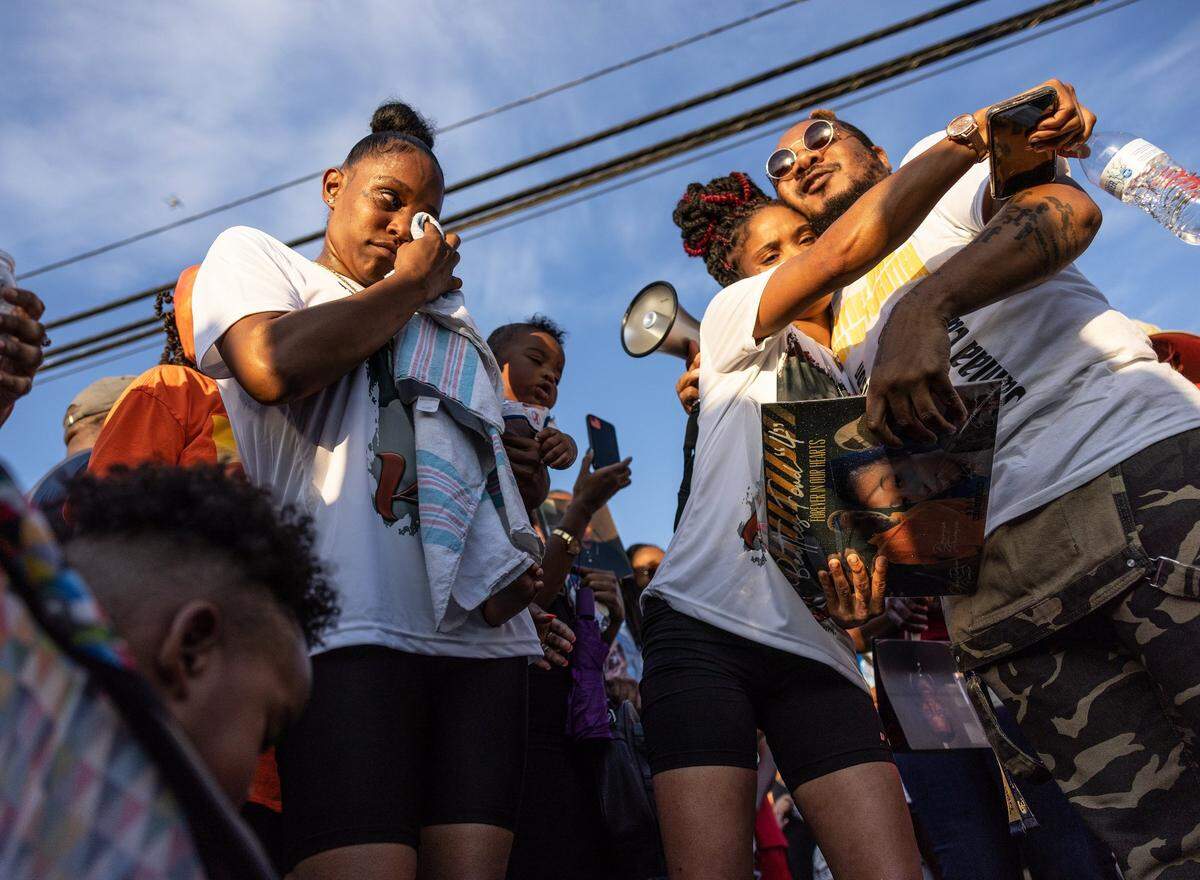 Family and friends gather for a memorial for the four people killed in the Juneteenth shooting on Beatties Ford Road two years ago in Charlotte, June 22, 2022.
