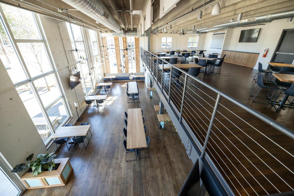 Large windows allow in natural light over the open spaces at Protagonist Beer in Lower South End.