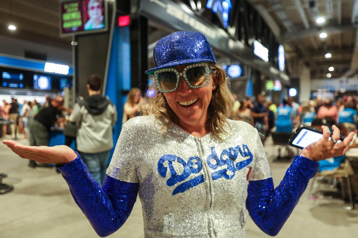 “I’m a huge Elton John fan; I love him. I love him!” Exclaims Asta Keene, who traveled from Colorado to attend the Farewell Yellow Brick Road tour at Bank of America Stadium on Sunday, September 18, 2022 in Charlotte, NC. Keene wore a full body sequined outfit inspired by Elton John’s iconic Los Angeles Dodgers costume, “I found it on Amazon,” says Keene, who received tickets to the concert as a fortieth birthday present.