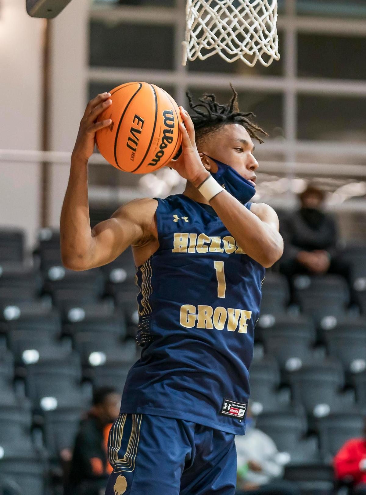 Hickory Grove’s DJ Cuttion (1) grabs the defense rebound at the Phenom Holiday Classic Wednesday December 23, 2020.