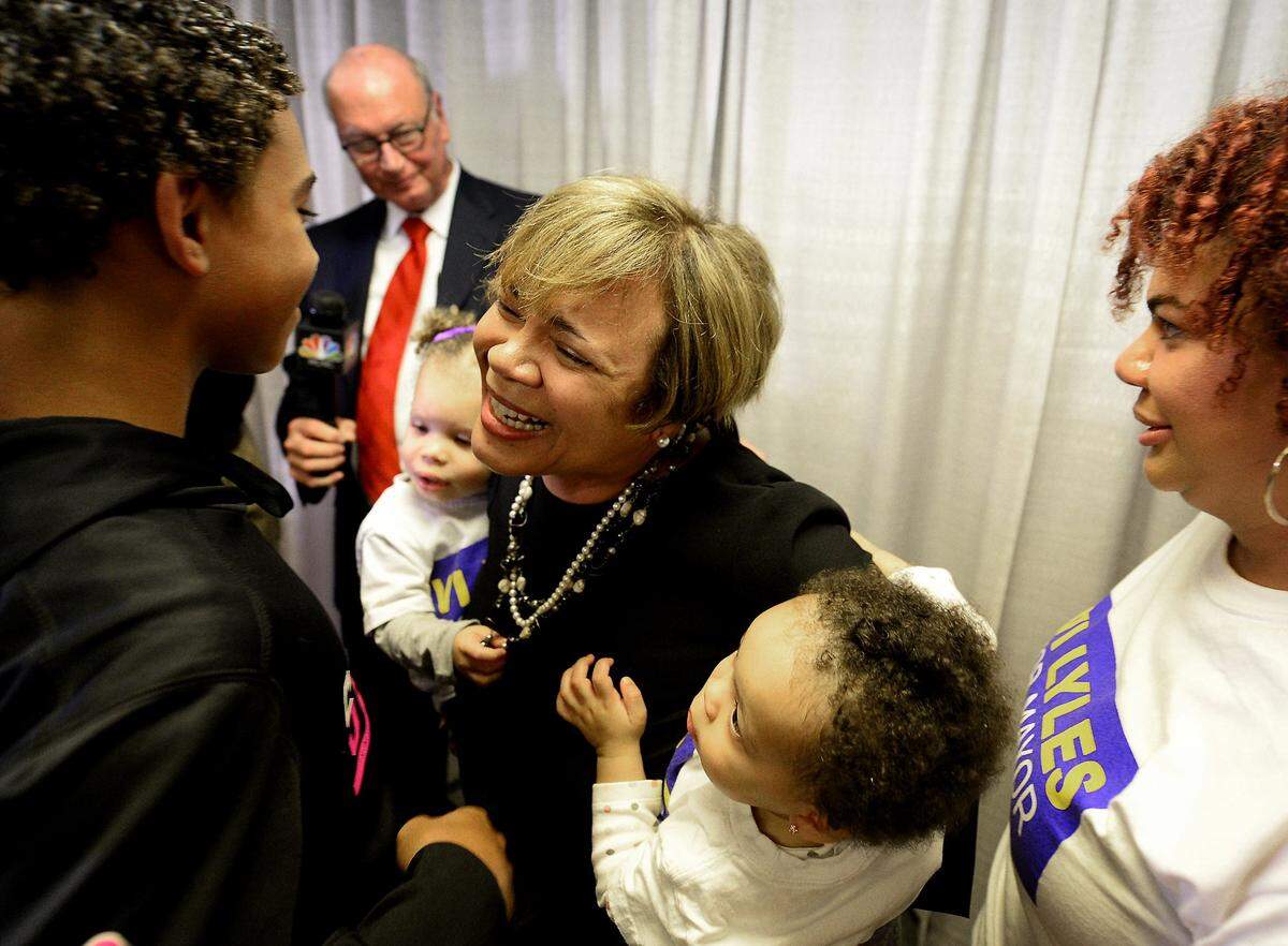 Charlotte Mayor Elect Vi Lyles, center, is congratulated by family and supporters on Tuesday, November 7, 2017 after defeating Kenny Smith. The victory for Lyles made her the first African American female to hold the office.