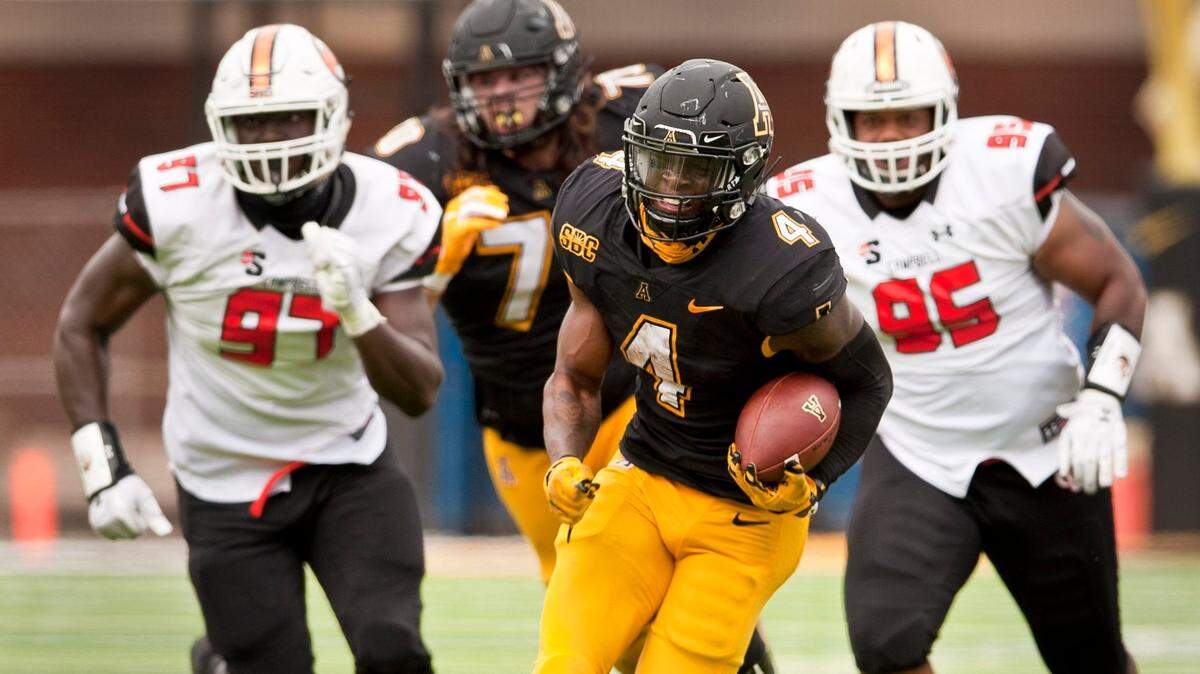 Appalachian State running back Daetrich Harrington finds a hole in the Campbell defense to break loose for a 40 yard touchdown run during the second half an NCAA college football game, Saturday, Sept. 26, 2020 at Kidd Brewer Stadium in Boone, N.C.