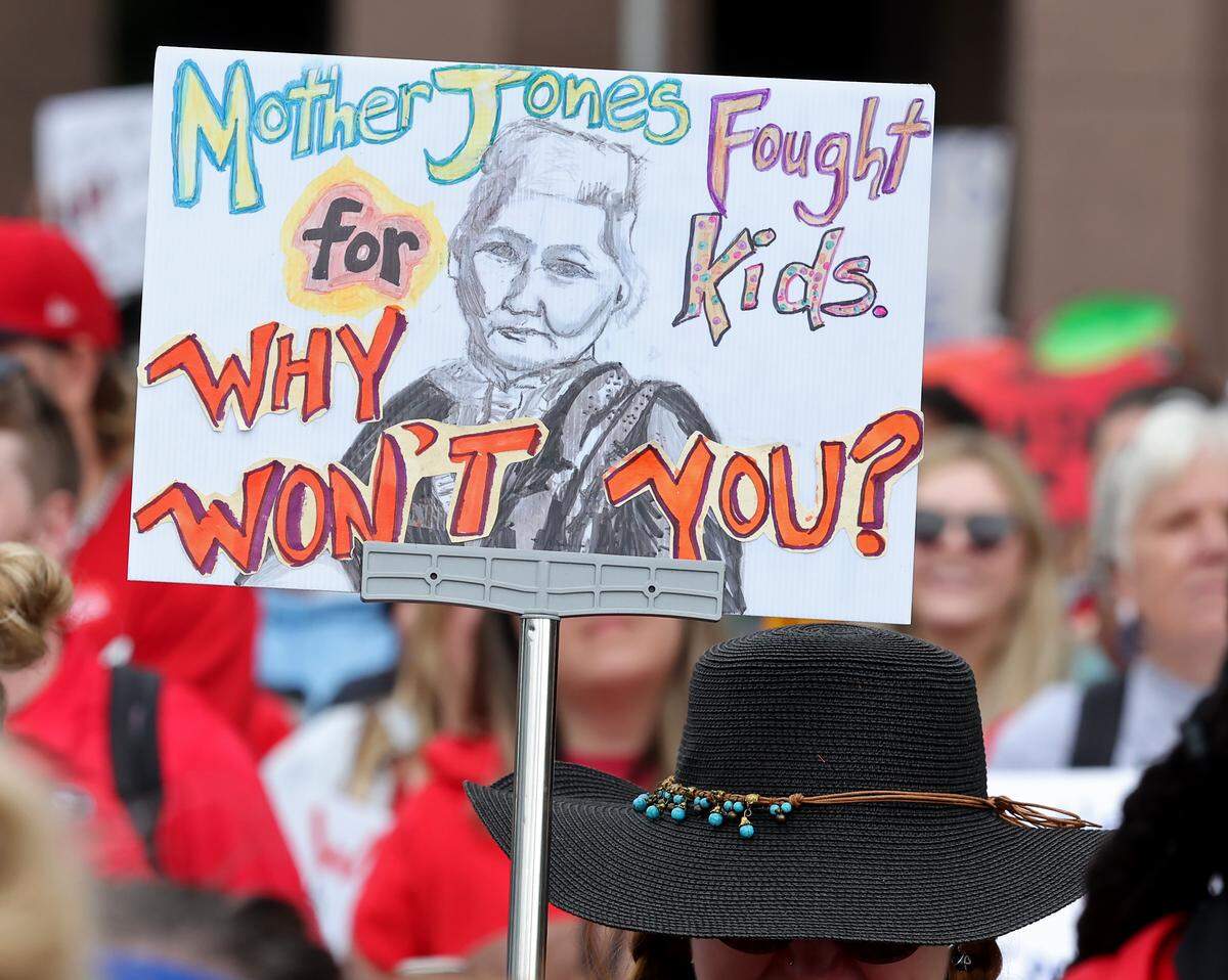 Signs, signs, signs were everywhere as teachers rallied at the Government Complex in Raleigh.