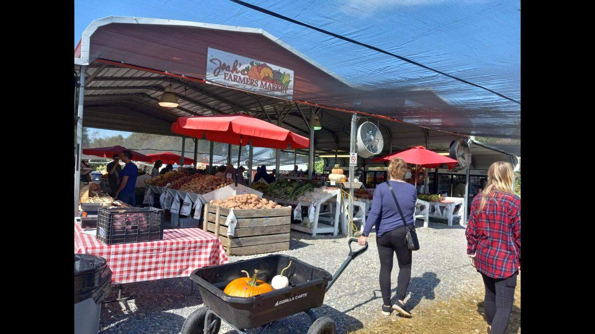Josh's Farmers Market, a popular family-run outdoor market beside Lowe's YMCA in Mooresville, must operate in a building or face ongoing daily fines, Mooresville town officials said on Oct. 15, 2022.