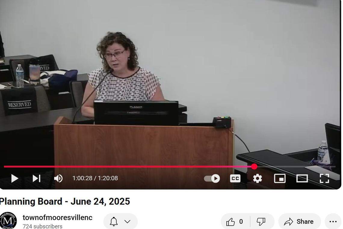 Amy Doughten, co-founder of a local cat rescue group, speaks to the Mooresville Planning Board on June 24, 2025, about plans for a cat café downtown.