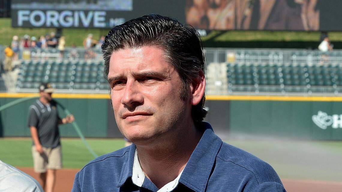 Will Graham watches a video presentation about his grandfather, Billy Graham, before a Charlotte Knights game in 2017. Will Graham, also an evangelist, took to Twitter on Friday to deny rumors that he was the North Carolina pastor who urinated on a woman aboard an airplane.
