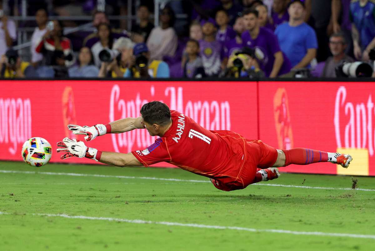 Charlotte FC goalkeeper Kristijan Kahlina (1) makes a save during the first half in a 2024 MLS Cup Playoffs Round One match against Orlando City at Inter&Co Stadium. Mike Watters-Imagn Images
