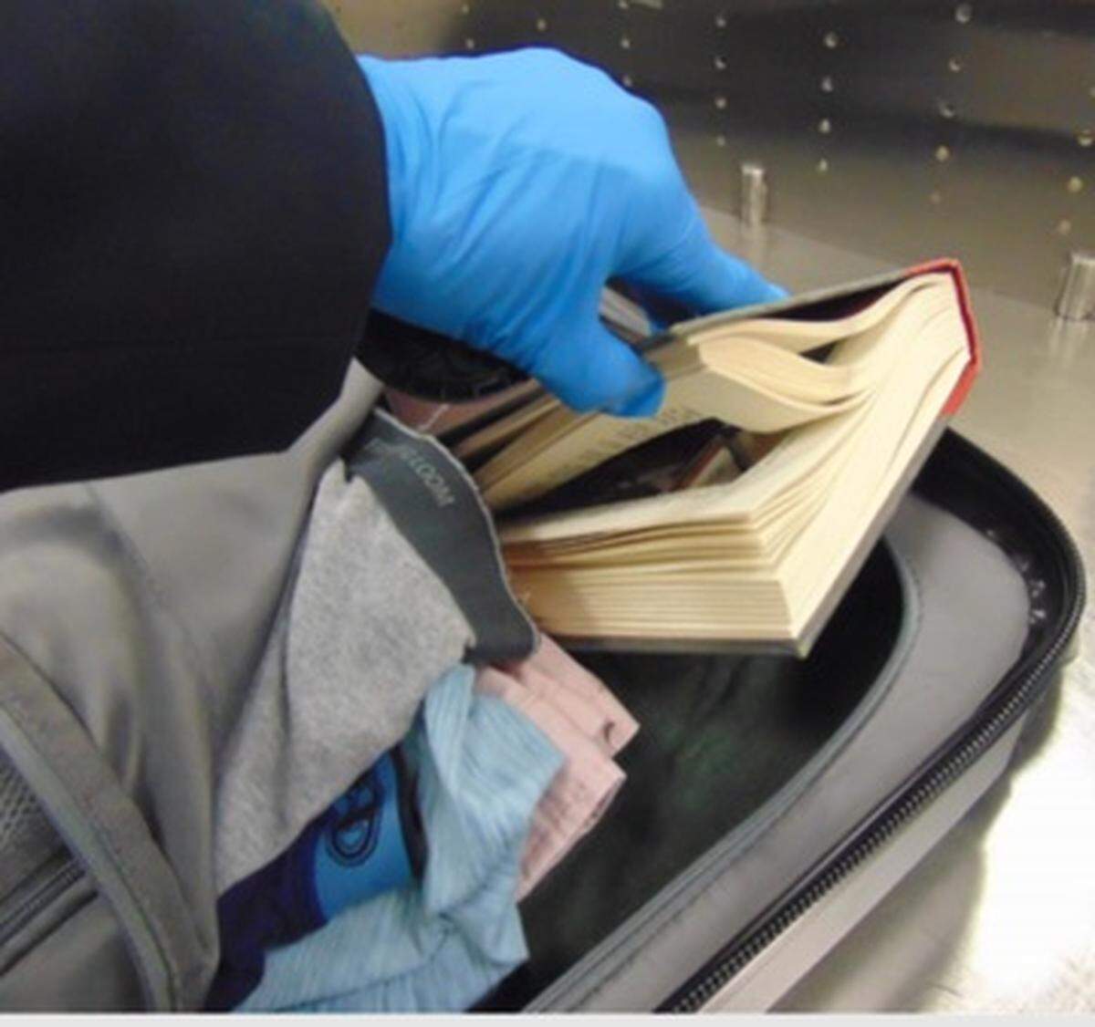 A Florida airport passenger bound for Charlotte faces a fine after TSA agents said the flier tried to “trick us” by concealing knives in a hollowed-out book.