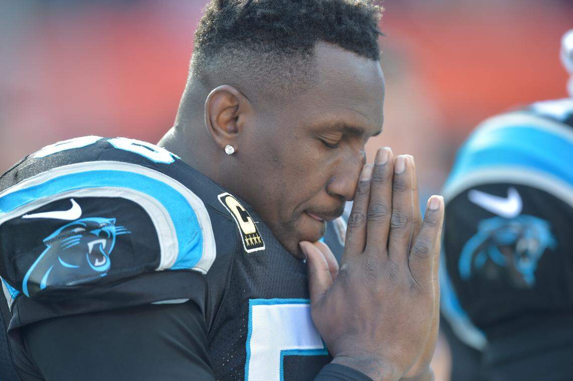 Carolina Panthers outside linebacker Thomas Davis reacts during the national anthem before an NFL football game against the Cleveland Browns, Sunday, Dec. 9, 2018, in Cleveland. Cleveland won 26-20. (AP Photo/David Richard)