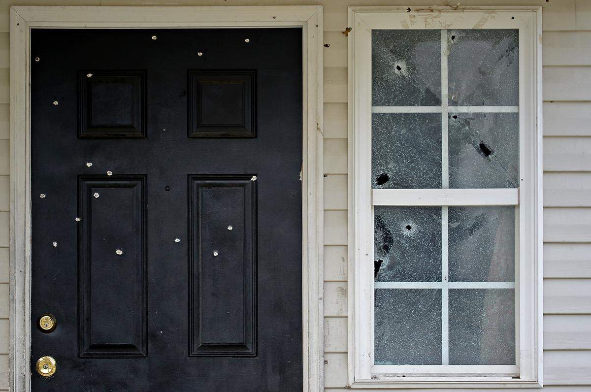 Bullet holes cover the exterior of the home where three-year-old Asiah Figueroa was killed in a late night shooting on Tuesday, September 7, 2021, in Charlotte.