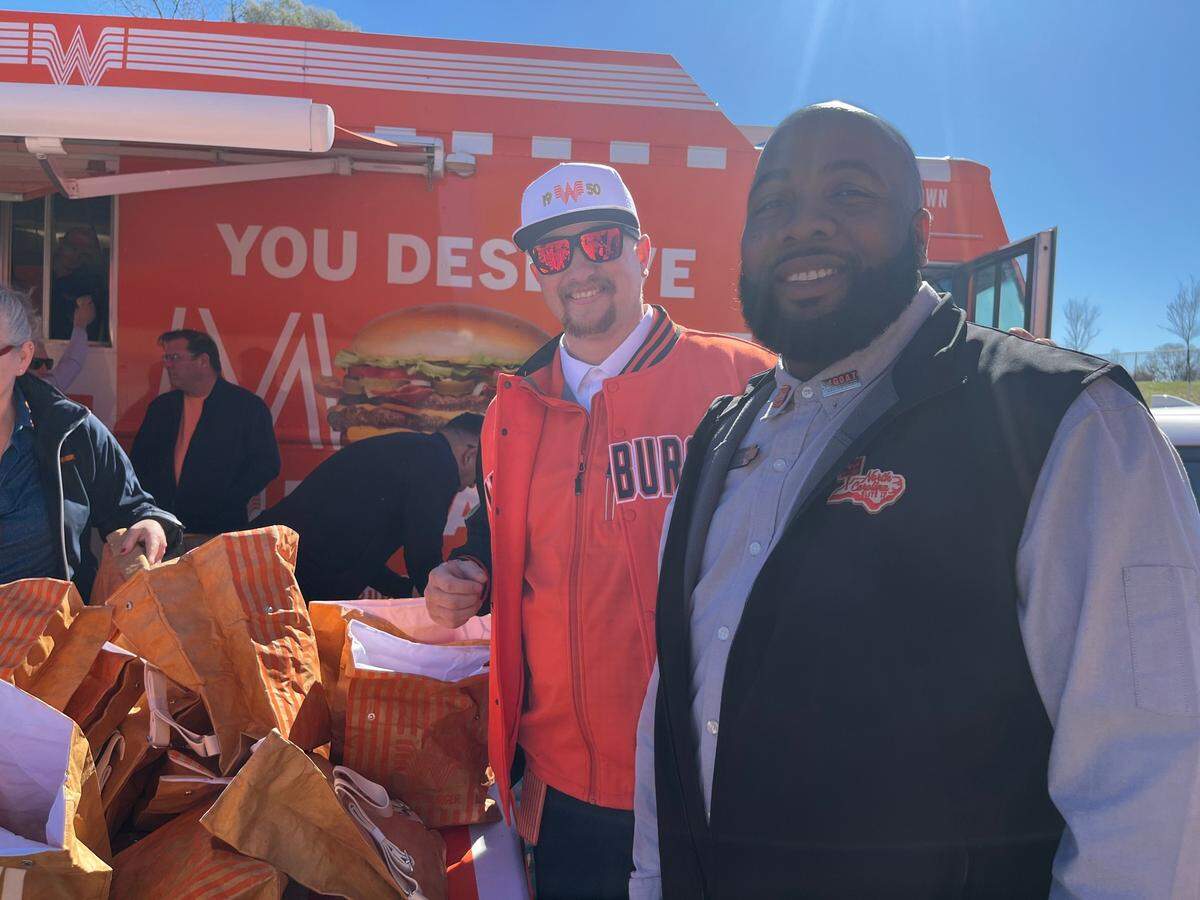 Preston Hughes of Whataburger and Anthony Moss, an operating partner opening one of the first Charlotte-area Whataburger locations.
