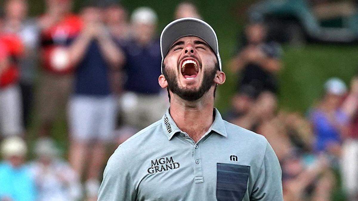 Max Homa celebrates after his putt on the 18th hole that clinched his victory at the Wells Fargo Championship at Quail Hollow Club in Charlotte on Sunday. Homa won his first PGA Tour tournament by three strokes.