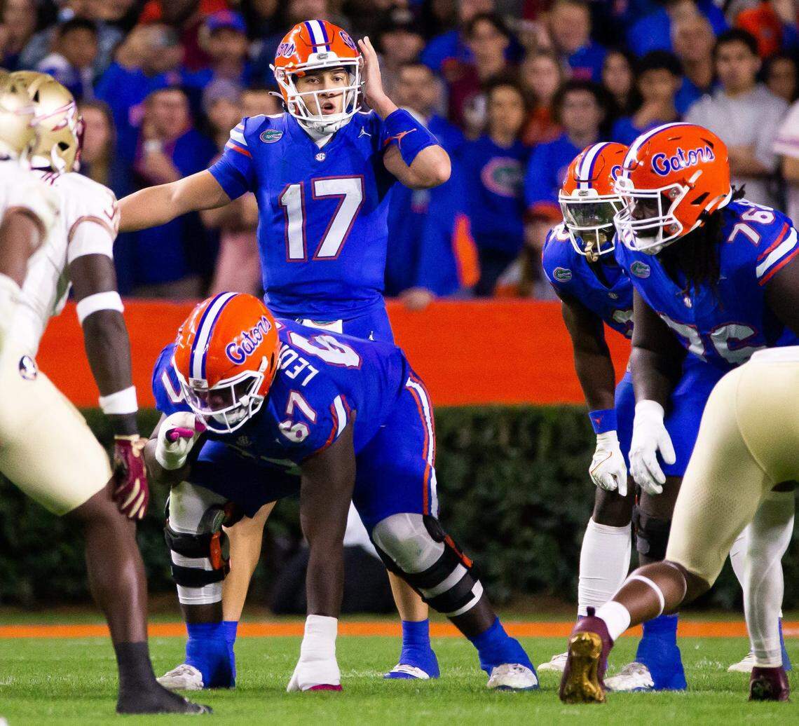 Florida Gators quarterback Max Brown (17) makes a play call at Steve Spurrier Field at Ben Hill Griffin Stadium in Gainesville, FL on Saturday, November 25, 2023 during the first half.