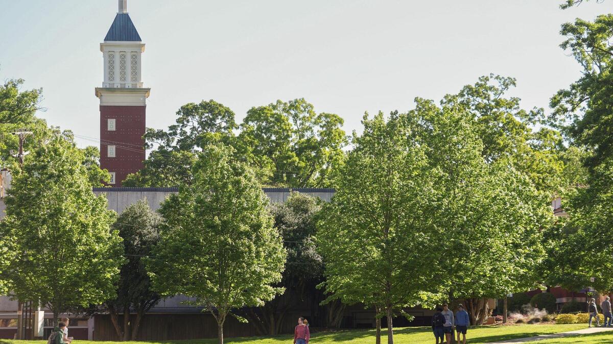 Queens University has named an acting president as it searches for a permanent successor to Daniel Lugo.