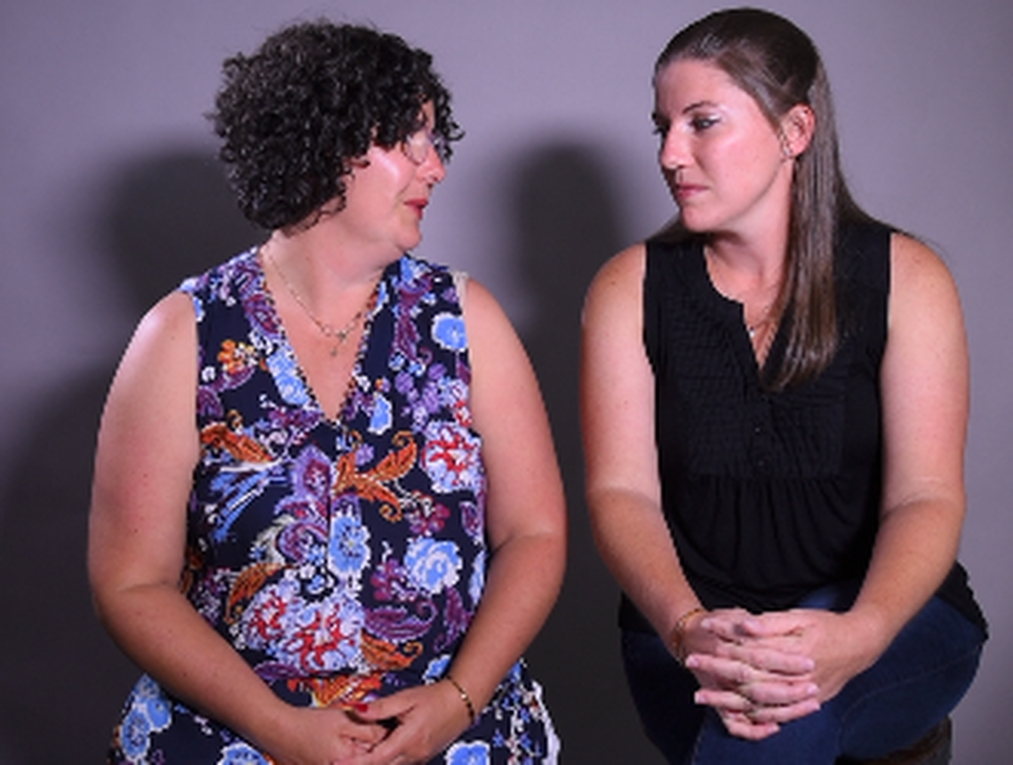“To feel like you finally have a voice is very empowering,” said Amanda Johnson (right, pictured here with her sister, Miracle Balsitis), after learning that Pastor Chuck Wilson removed the photo of her father from a wall at Matthews United Methodist Church..