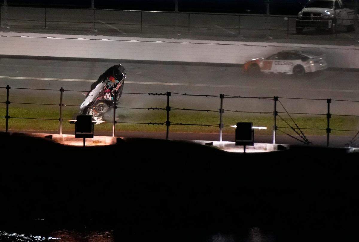Ryan Preece flips multiple times during the runing of the Coke Zero Sugar 400 at Daytona International Speedway, Saturday, Aug. 26, 2023.
