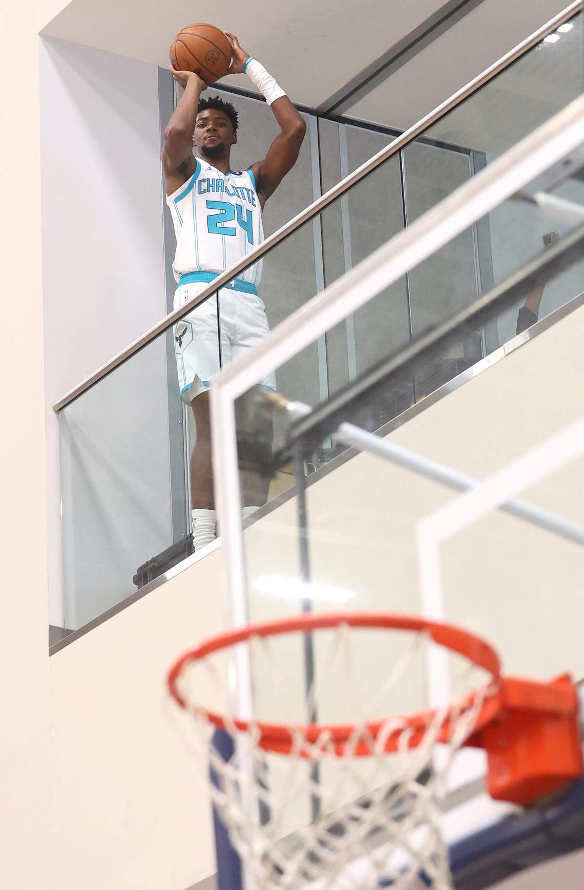 Charlotte Hornets Brandon Miller shoots from a second floor overlook at Curry Arena on the campus of Queens College during media day. 
